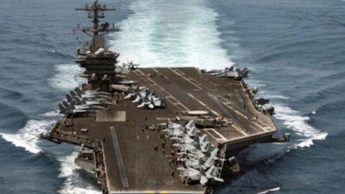 Kapal Induk USS Theodore Roosevelt saat dikirim ke Teluk Persia untuk mengawasi kemungkinan Iran mengirimkan senjata ke Yaman.