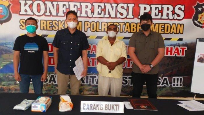 Rakesh (42) pemilik Warkop DKI di Jalan Gatot Subroto kembali dijadikan tersangka kasus penyiraman anggota Satpol PP oleh Satreskrim Polrestabes Medan.