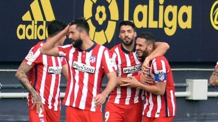 Luis Suarez dan pemain Atletico Madrid merayakan gol mereka ke gawang Cadiz CF pada laga lanjutan Liga Spanyol jornada 21, Minggu, 31 Januari 2021 malam WIB.