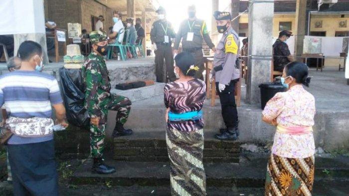Situasi pelaksanaan Pilkel di Banjar Lambing, Desa Mekar Bhuana, Kecamatan Abiansemal, Kabupaten Badung, Bali, 7 Februari 2021.
