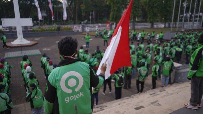 Momen HUT ke-77 Kemerdekaan RI Mitra Gojek menggelar kegiatan sosial.
