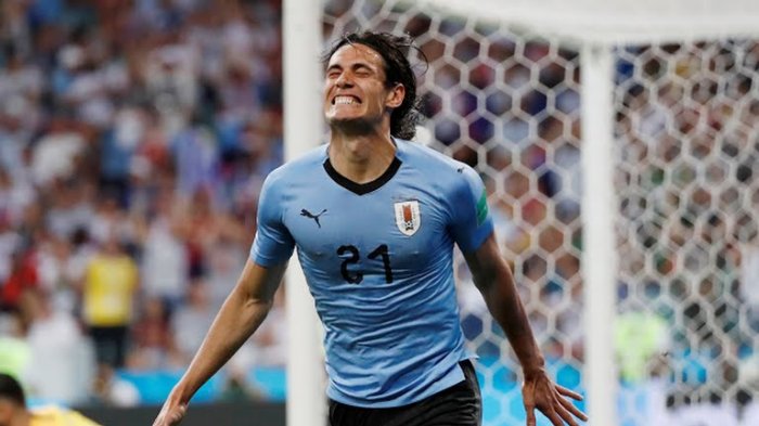 Edinson Cavani usai mencetak gol perdana untuk Uruguay saat melawan Portugal, skor 1-0.