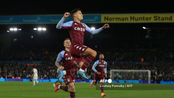 Gelandang Aston Villa asal Brasil Philippe Coutinho (tengah) melakukan selebrasi setelah mencetak gol pembuka pertandingan sepak bola Liga Inggris antara Leeds United dan Aston Villa di Elland Road di Leeds, Inggris utara pada 10 Maret 2022.
Lindsey Parnaby / AFP