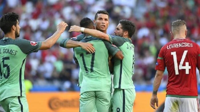 Ronaldo merayakan gol yang dicetak ke gawang Hungaria, Rabu (22/6/2016)