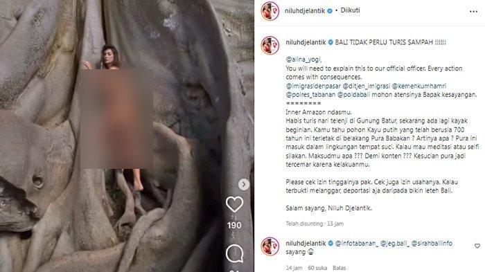 Tangkap layar video bule berpose di pohon keramat di Tabanan, Bali.