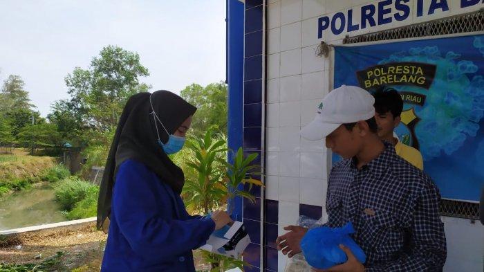 Bakti sosial PMII Ibnu Sina Batam rangkaian hari ulang tahun Nahdlatul Ulama yang ke-98, Minggu (28/2/2021).