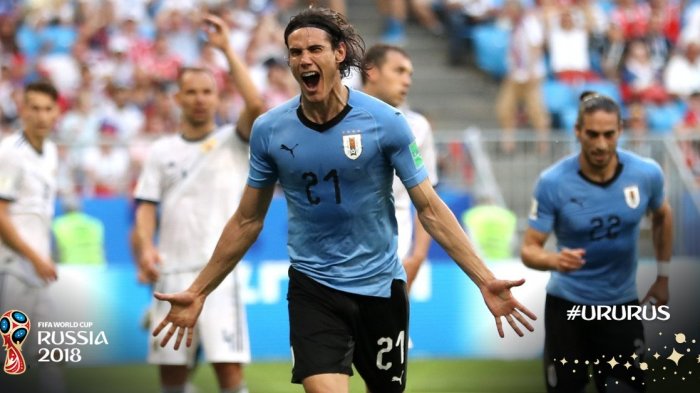 Selebrasi Edison Cavani setelah mencetak gol ketiga Uruguay menghadapi Rusia, Senin (25/6/2018) malam.