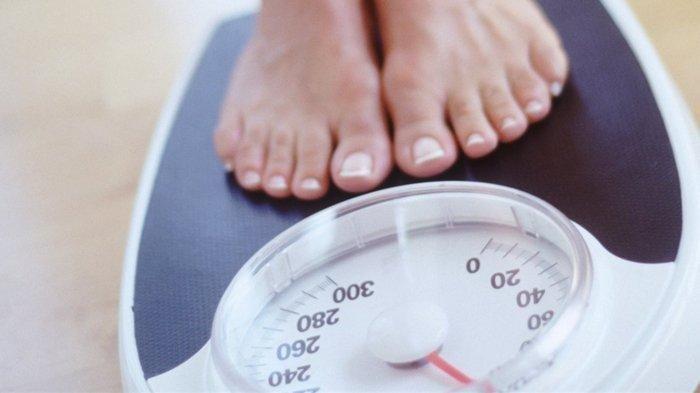 Menimbang Berat Badan