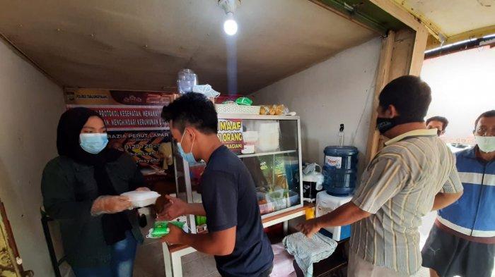 RAZIA PERUT LAPAR - Razia Perut Lapar (RPL) anggota Polres Tanjungpinang Bripka Zulhamsyah Putra, Rabu (30/6/2021). Ia kini membuka warung makan yang terletak di Jl Ahmad Yani, KM 5 tepatnya di depan RRI Tanjungpinang.