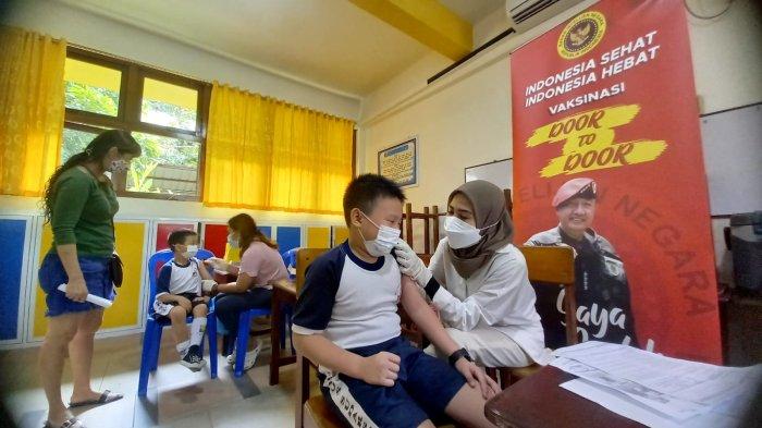 VAKSINASI ANAK-Binda Kepri menggelar vaksinasi perdana Covid-19 bagi anak usia 6-11 tahun di Sekolah Dasar Yos Sudarso.