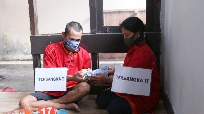 Kepolisian Sektor Telukbetung Selatan bersama Inafis Polresta Bandar Lampung menggelar rekonstruksi kasus pembunuhan bayi yang dilakukan ibu kandung dan selingkuhannya, Kamis (25/2/2021).