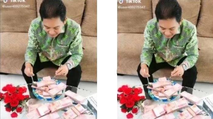 Sebuah video yang memperlihatkan seorang pria pamer gepokan uang yang berserakan di atas meja viral di media sosial.