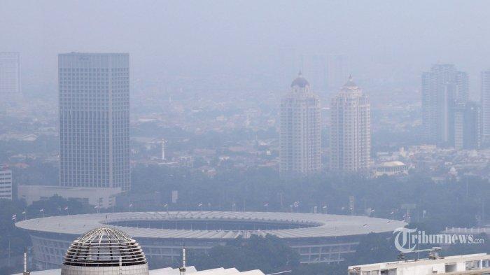 ILUSTRASI - Pemandangan gedung bertingkat diselimuti polusi udara di Jakarta, simak ulasan dr. Feni Fitriani Taufik, Sp.P(K)