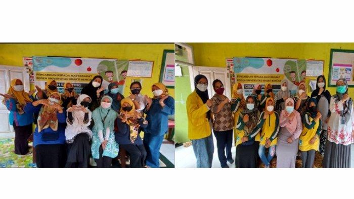 Tim Pengmas LPPM Universitas Bhakti Kencana beserta Kader Posyandu RW03 Cibiru Hilir