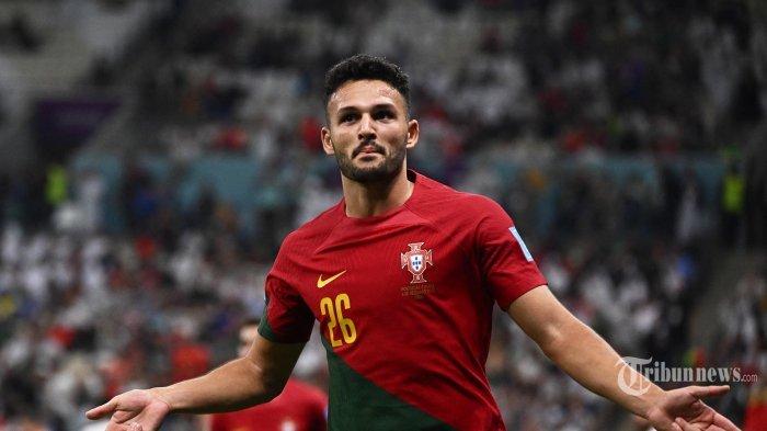 Penyerang Portugal #26 Goncalo Ramos merayakan gol ketiga timnya selama pertandingan sepak bola babak 16 besar Piala Dunia 2022 Qatar antara Portugal dan Swiss di Stadion Lusail di Lusail, utara Doha pada 6 Desember 2022. (Fabrice COFFRINI / AFP)