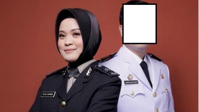 Briptu Suci Darma dan DKM.