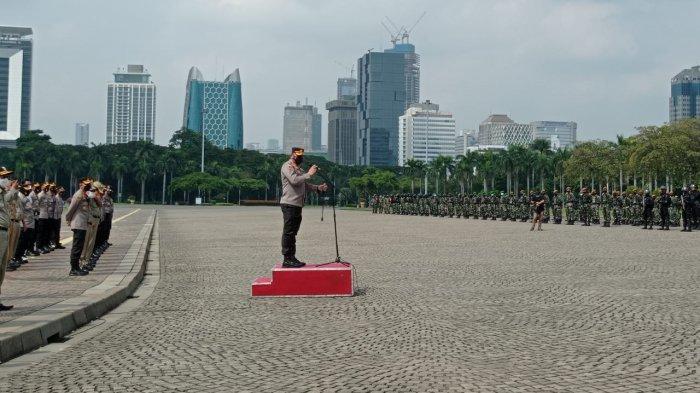 Apel pengamanan Pasar Tanah Abang di kawasan Monas, Gambir, Jakarta Pusat, Minggu (2/5/2021).