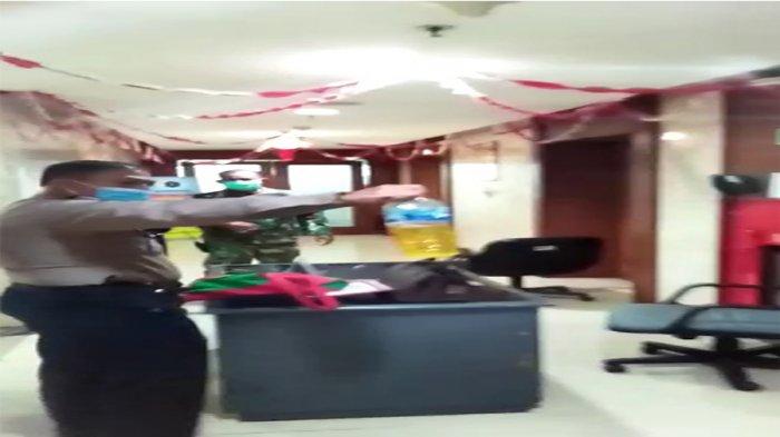 Tangkapan layar seorang wanita membawa bensin menyelinap masuk ke Balai Kota DKI
