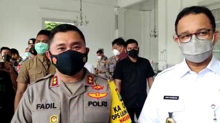 Kapolda Metro Jaya Irjen Pol Fadil Imran dan Gubernur DKI Jakarta Anies Baswedan usai pertemuan di Balai Kota DKI Jakarta, Gambir, Jakarta Pusat, Rabu (29/12/2021).