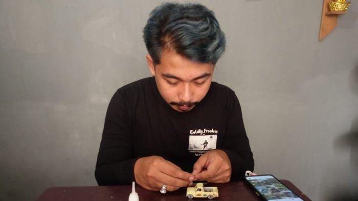 Andi Dwi Setiono pemilik UMKM andiecast custom. ( Tribunjambi.com / M Yon Rinaldi )