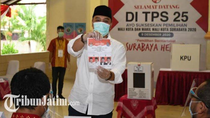 Calon Wali Kota, Eri Cahyadi nyoblos di TPS 25 Ketintang Selatan, Rabu (9/12).