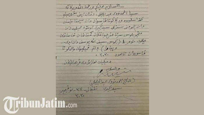 Tulisan tangan KH Nawawi Abdul Djalil berisi maklumat dengan aksara arab pegon yang isinya menginstruksikan seluruh alumni santri serta warga Kota Pasuruan mencoblos pasangan nomor urut 01 Saifullah Yusuf (Gus Ipul)-Adi Wibowo (Mas Adi).