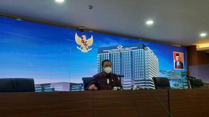 Ketua PBSI Agung Firmansah Sampurna angkat bicara soal kabar pebulu tangkis Indonesia yang dipaksa mundur dari All England 2021. Foto diambil di Gedung BPK RI, Kamis (18/3/2021).