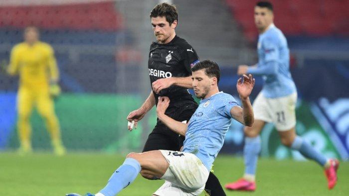 Ruben Dias dan Jonas Hofmann di leg pertama babak 16 besar Liga Champions, Borussia Moenchengladbach vs Manchester City di Puskas Arena di Budapest pada 24 Februari 2021.