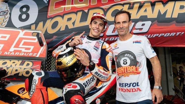 Marc Marquez dan manajer tim Repsol Honda Alberto Puig