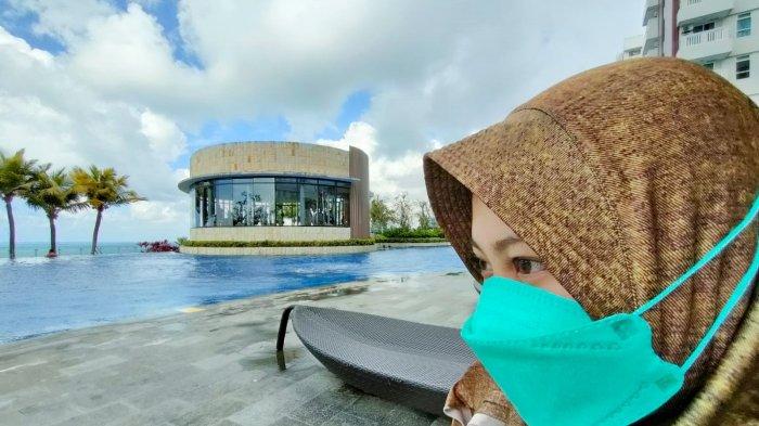 Warga mengenakan masker dalam masa pandemi Covid-19 di Kalimantan Timur.