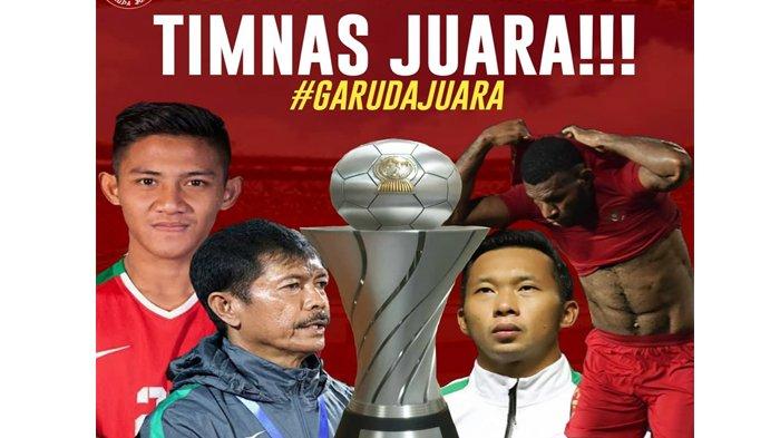 Pelatih Timnas U-22 Indonesia, Indra Sjafri mengangkat trofi saat timnas U-22 Indonesia meraih juara lawan Thailand, Selasa (26/2/2019).
