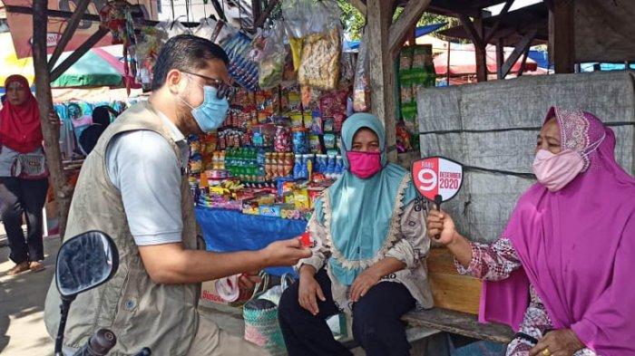 Sosialisisasi 12 Hal Baru dalam pelaksanaan pemungutan suara di TPS disosialisasikan KPU Way Kanan di Pasar Banjit.