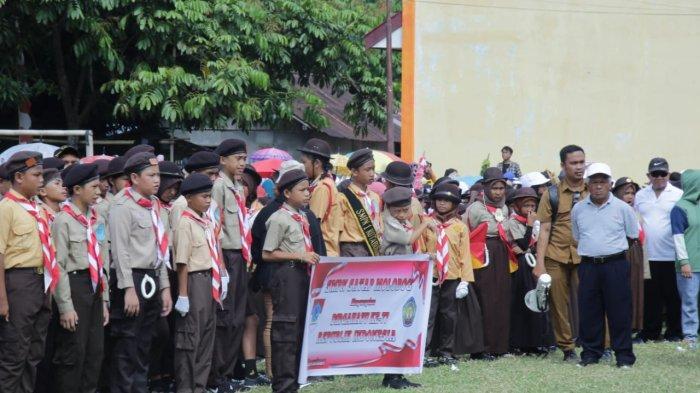 Bupati Bolaang Mongondow Timur, Sam Sachrul Mamonto, membuka lomba Drumband dan Gerak Jalan tingkat Kabupaten, Senin 15/8/2022.