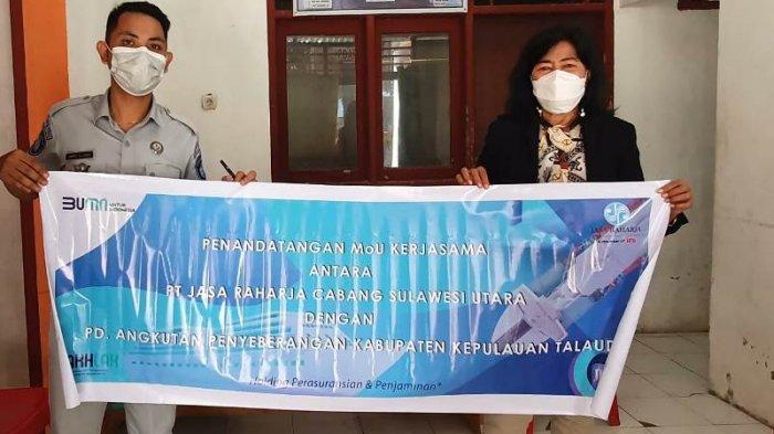 Penandatanganan MoU pemberian Perlindungan Asuransi Penumpang bagi masyarakat yang menumpangi kapal penyeberangan dari Likupang ke Talaud antara Jasa Raharja dan PD Angkutan Penyeberangan Kabupaten Kepulauan Talaud.