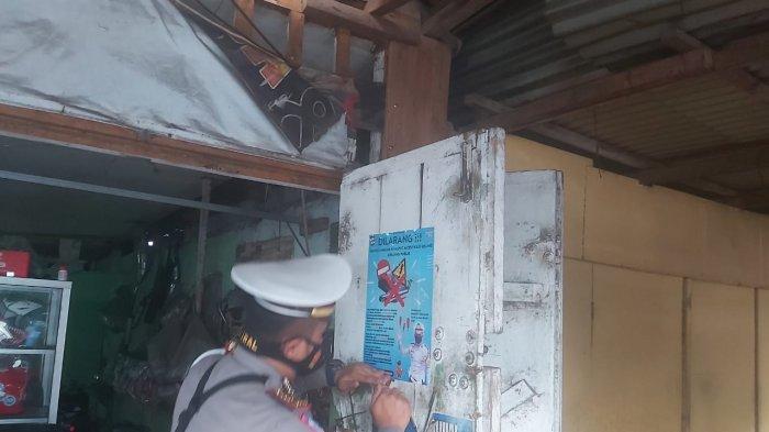 Satlantas Polres Bitung ketika melakukan sosialisasi ke bengkel dan toko yang menjual knalpot racing, Selasa (16/3/2021)