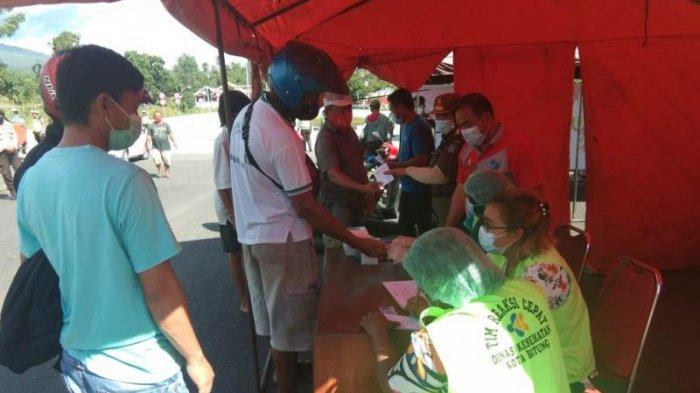 Satlantas Polres Bitung pelaksanaan penyekatan orang yang masuk ke Bitung