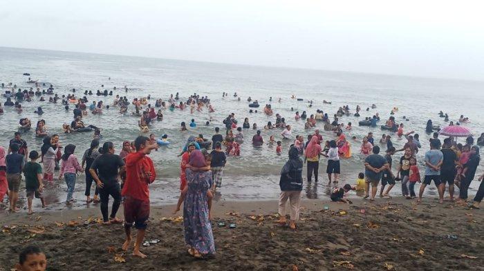 Tradisi mandi safar yang dilakukan oleh warga Bolmong.