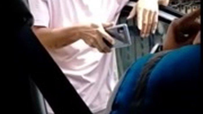 Tangkapan layar seorang perempuan petugas PLN di Medan diludahi pelanggan saat menagih tunggakan rekening listrik.