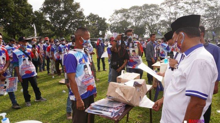 Pasangan bakal calon (bacalon) Bupati-Wakil Bupati Simalungun Muhajidin Nur Hasim-Tumpak Siregar (Hasim-TPS) melantik Korcam dan Kordes di Lapangan Bola PTPN 3 Sei Mangkei, Kecamatan Bosar Maligas, Minggu (20/9/2020) kemarin.