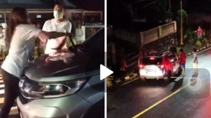 Sepasang suami istri berdebat di jalan karena selingkuhan.