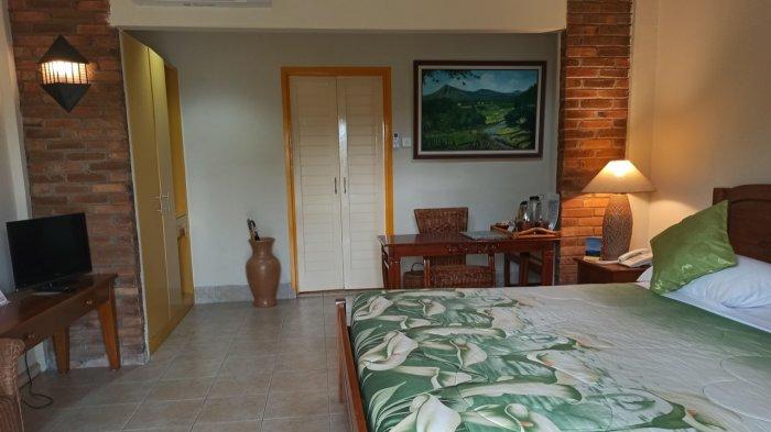 Salah satu kamar di Hotel Deli River
