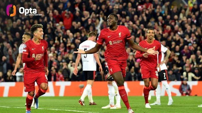 Ibrahima Konate merayakan gol untuk Liverpool ke gawang Benfica dalam partai Liga Champions di Anfield (13/4/2022).