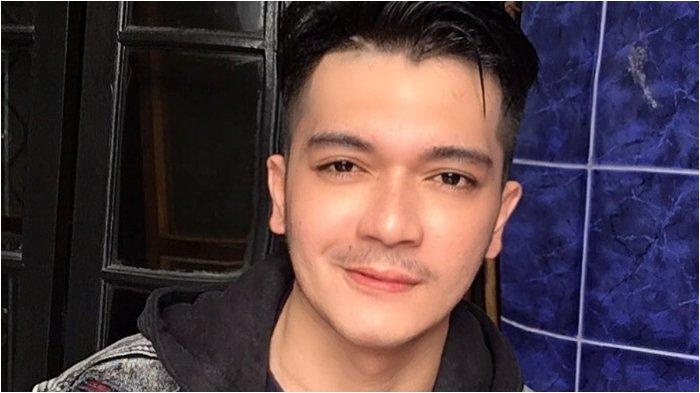 Mendiang Norman Divo semasa hidup