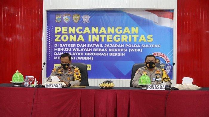 Tiga Satker dan delapan Satwil Polda Sulteng melaksanakan pencanangan Zona Integritas Wilayah Bebas Korupsi (WBK) dan Wilayah Birokrasi Bersih Melayani (WBBM) di ruang Torabelo Polda Sulteng (23/2/2021).
