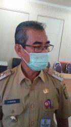 Bupati Kuansing Drs H Mursini / Palti Siahaan