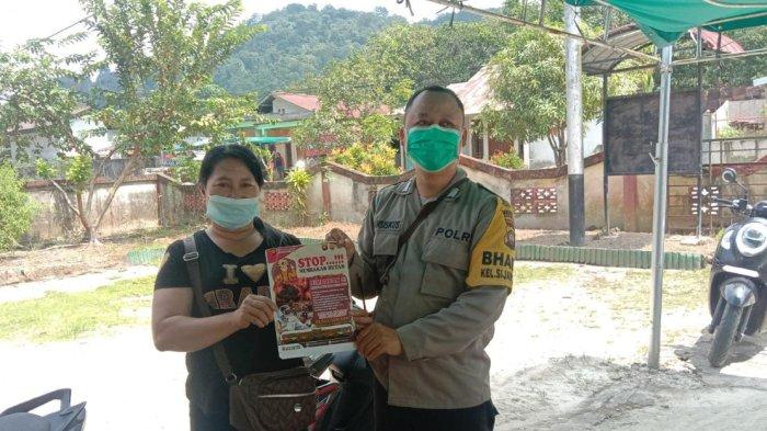 Bhabinkamtibmas sampaikan imbauan larangan bakar lahan kepada warga, Senin 21 Februari 2022