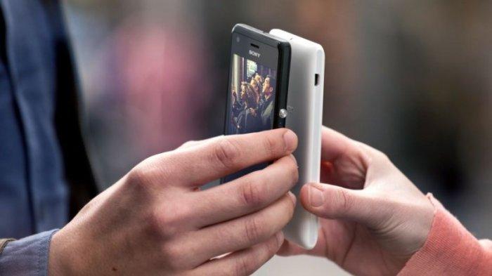 Ilustrasi fitur NFC untuk berbagi data