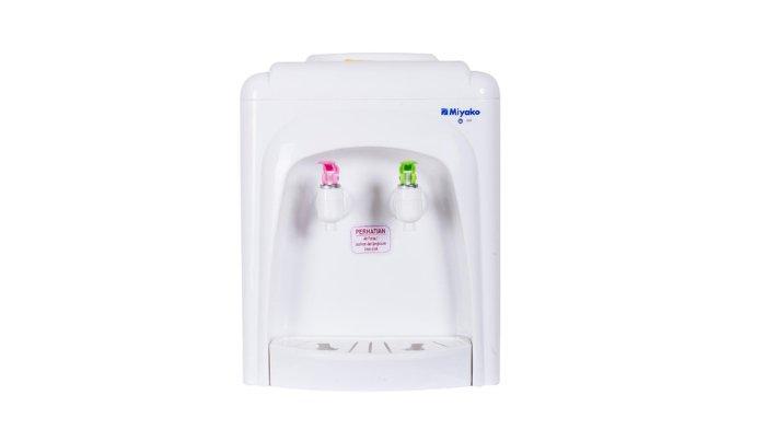 Miyako Water Dispenser Portable WD-185 H dengan desain full warna puitih yang tampak elegan tapi desainnya compact