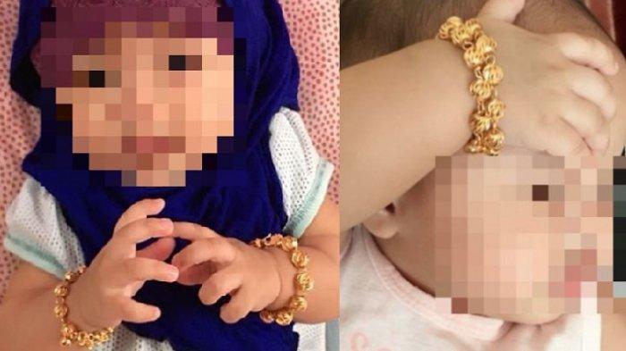 Bayi dipakaikan gelang emas