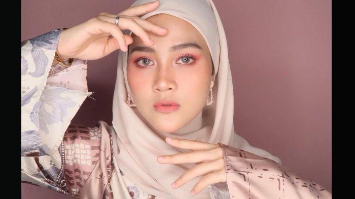 Profil Henny Rahman